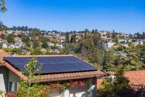 solar panels on residential rooftop under bright summer sun