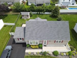 fire resistant metal roof vs asphalt shingles on home