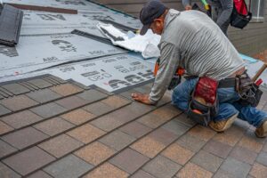 GAF master elite certified roofing contractor installing shingles on a residential home