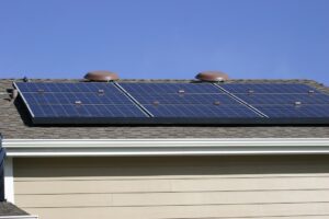 solar panels and battery storage system on a modern home rooftop