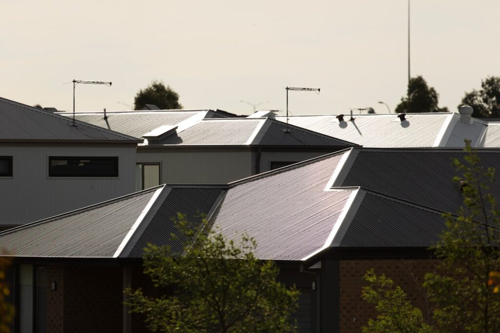 aging residential roof under sunlight showing wear and weathering